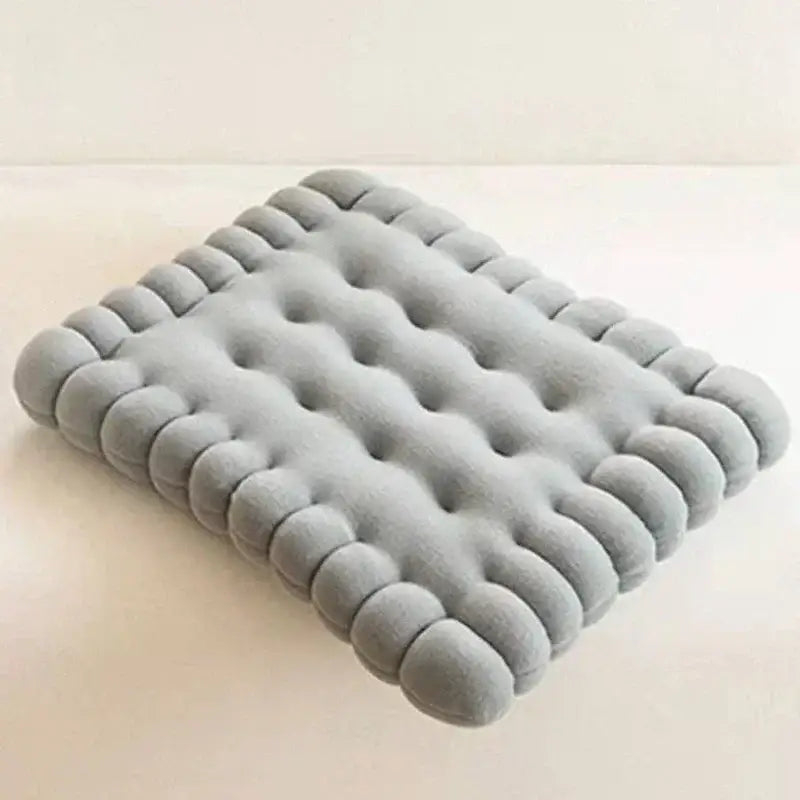 Gray tufted decorbites biscuit sofa cushion with plush texture and rounded edges for living room decor