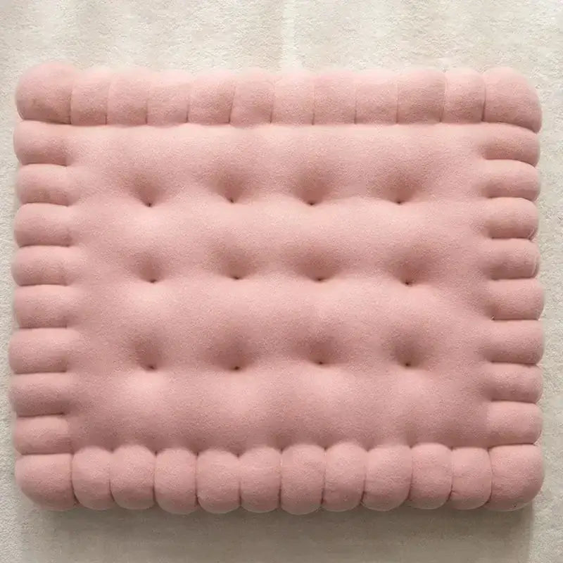 A soft pink plush biscuit sofa cushion with tufted indentations and piped edges for decorbites biscuit decor