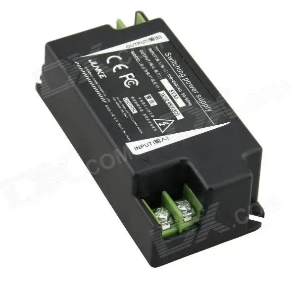 Black 15w led power supply adapter with green terminal connectors and white labeling for kitchen use