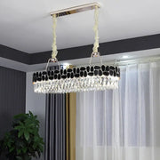 Elegant DecorBites black 8-head island lamp with sleek chrome frame and modern clear crystal prisms and accents