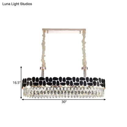 DecorBites black 8-head island lamp with modern clear crystal prisms and black onyx stones in a sleek silver frame