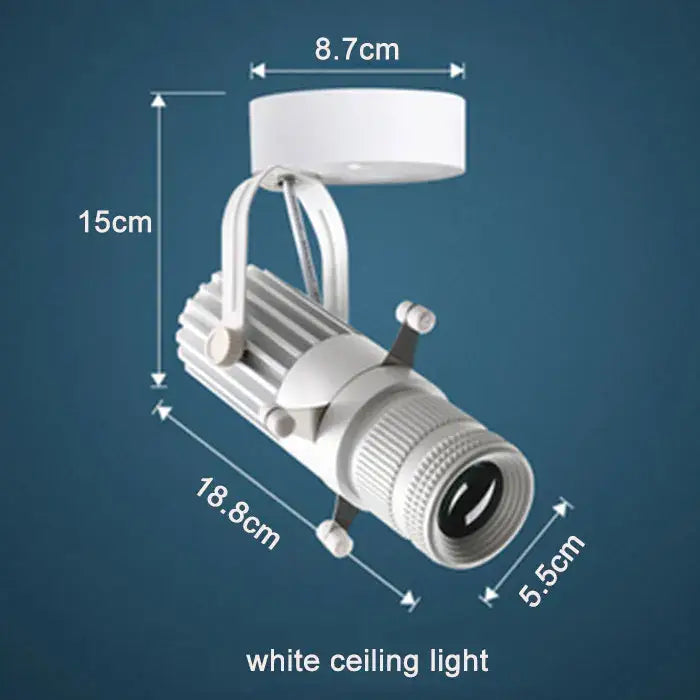White ceiling light with sleek ribbed texture and adjustable mounting as decorbites adjustable aperture led spotlight