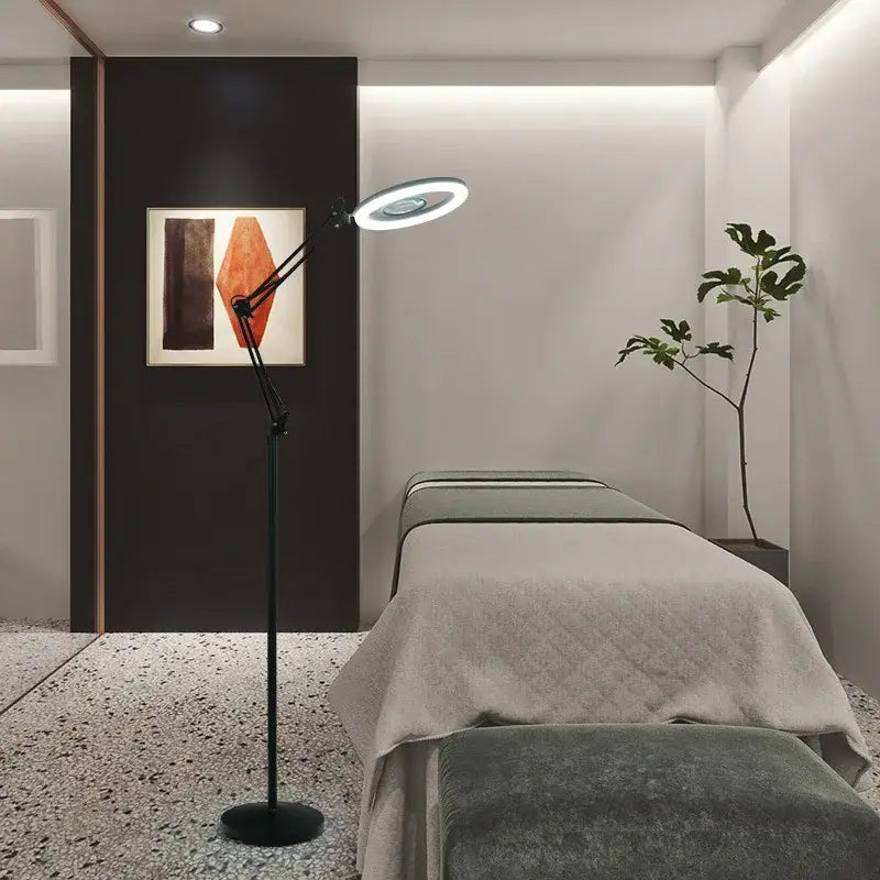 Black adjustable floor lamp with circular 25w led moon beauty light head for bedroom illumination