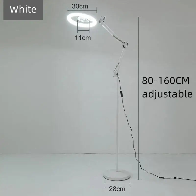 White adjustable floor lamp with circular led moon beauty light head and articulated arm for bedroom lighting