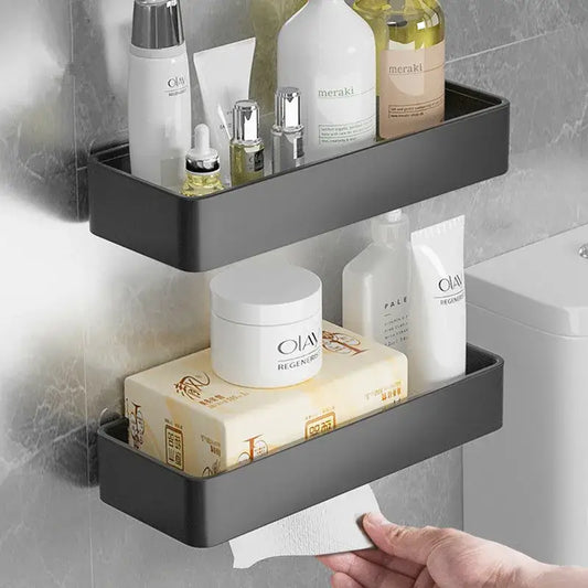 Black aluminum corner double tier shelf holding toiletries and tissue paper for aluminum corner bathroom storage by decorbites