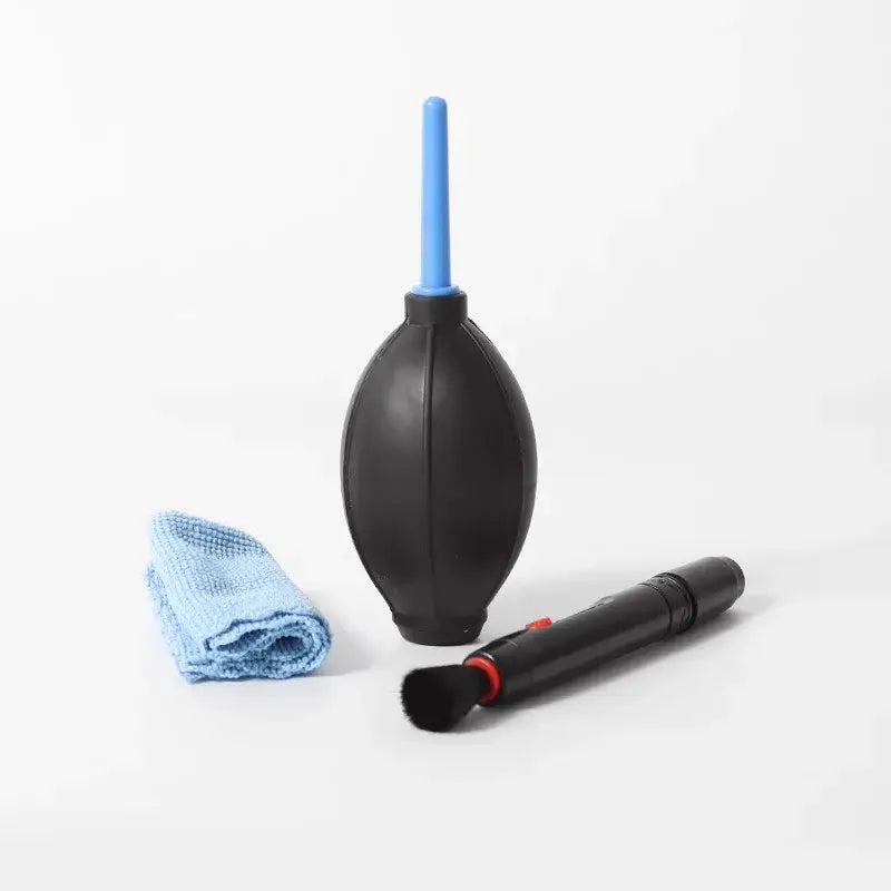 Black rubber blower with blue nozzle part of coffee grinder cleaning brush set for kitchen dust removal