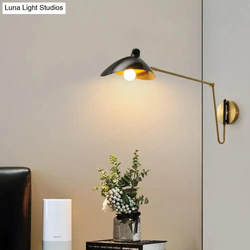 Black and brass adjustable joint wall lamp with duckbill reading light design for modern bedroom use