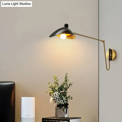 Black and brass adjustable joint wall lamp with duckbill reading light design for modern bedroom use