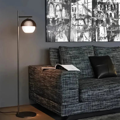 Modern floor lamp with brushed bronze dome shade and slender metallic pole suitable for decorbites black metal wall lamp use