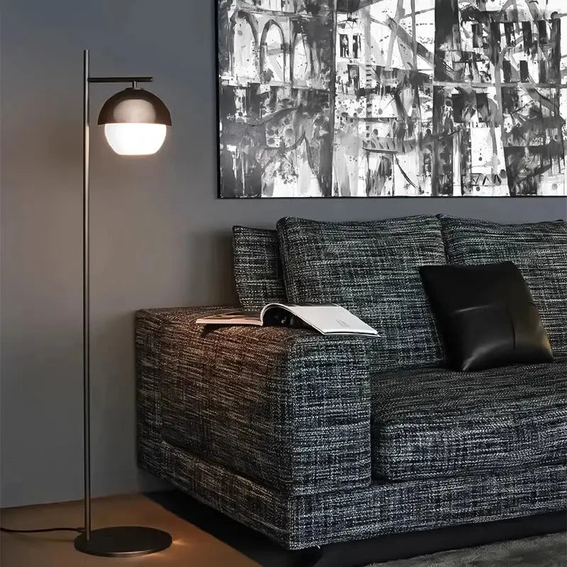 Modern floor lamp with brushed bronze dome shade and slender metallic pole suitable for decorbites black metal wall lamp use