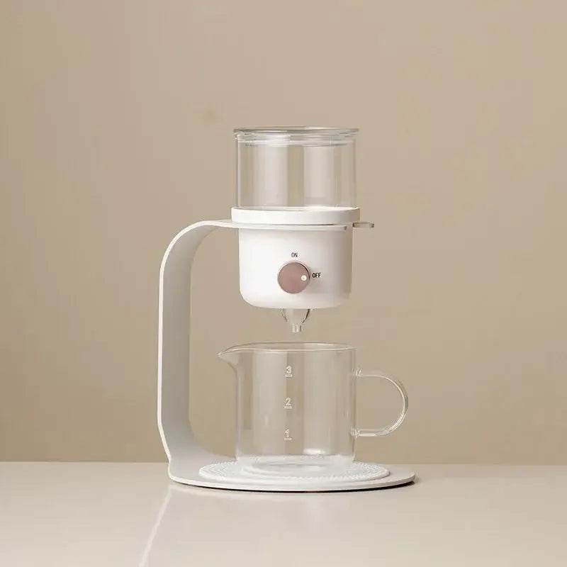 White electric pour-over coffee maker with clear glass reservoir and measuring cup for kung fu tea pot infuser use