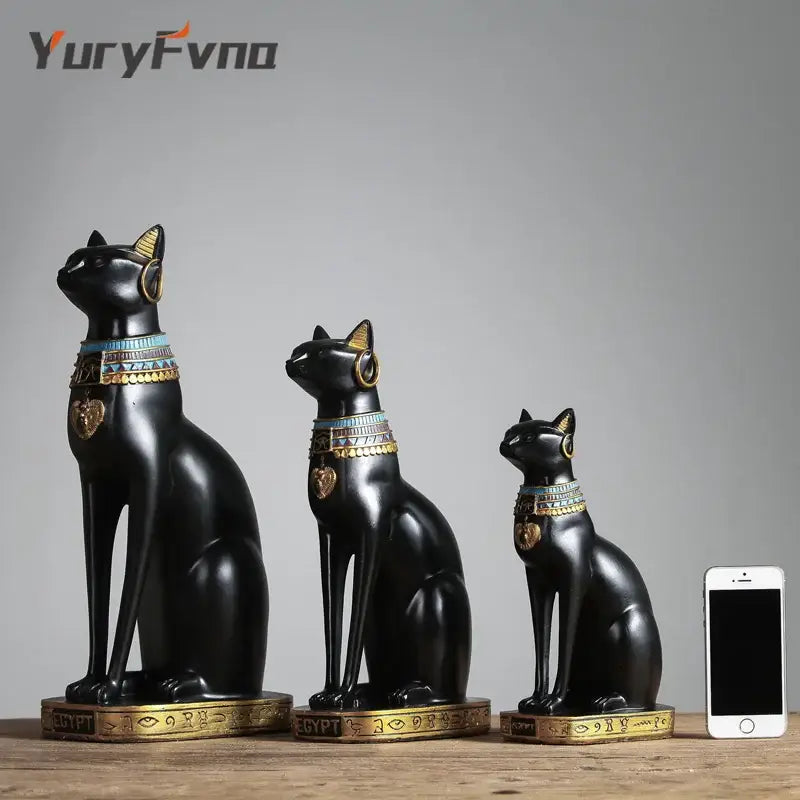 Set of three black bastet cat goddess statues with gold and blue decorative collars for living room decor by decorbites