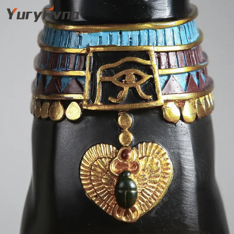Ornate egyptian-themed necklace with black base gold blue maroon bands eye of horus and gold scarab pendant for bastet cat goddess decorbites set
