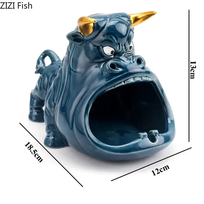 Dark blue ceramic ashtray shaped like a bull with gold horns and white eyes decorbites cartoon cow ceramic decor