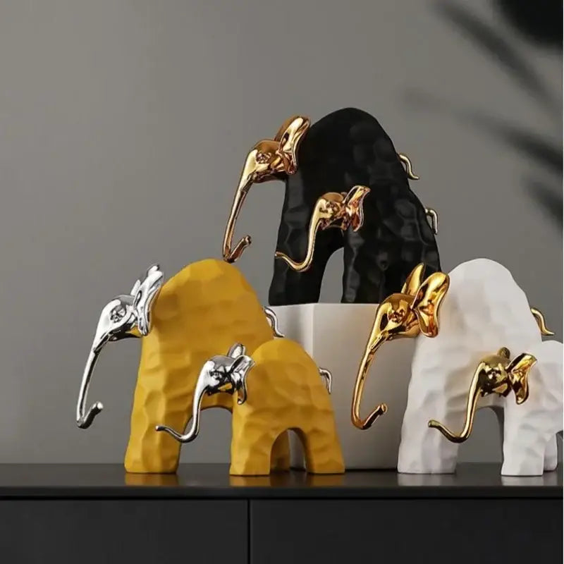 Set of modern golden resin decorbites elephant mother-calf sculptures in black gold silver and white for living room decor