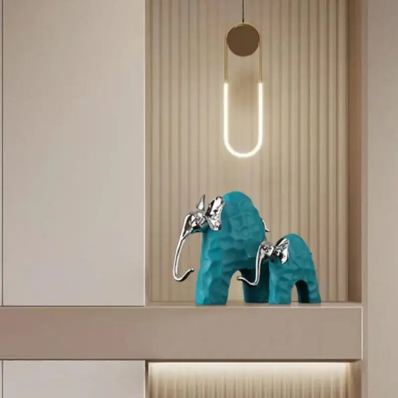 Teal ceramic decorbites elephant figurine with silver trims and butterfly accents for living room golden resin sculpture