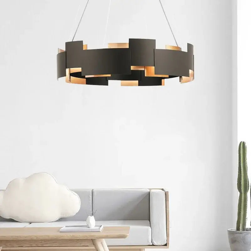 Modern black and gold geometric ceiling chandelier with circular segmented design in black scandinavian style for living room