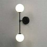 Black metal wall lamp with dual frosted golden glass globes perfect for decorbites golden glass led bedroom lighting