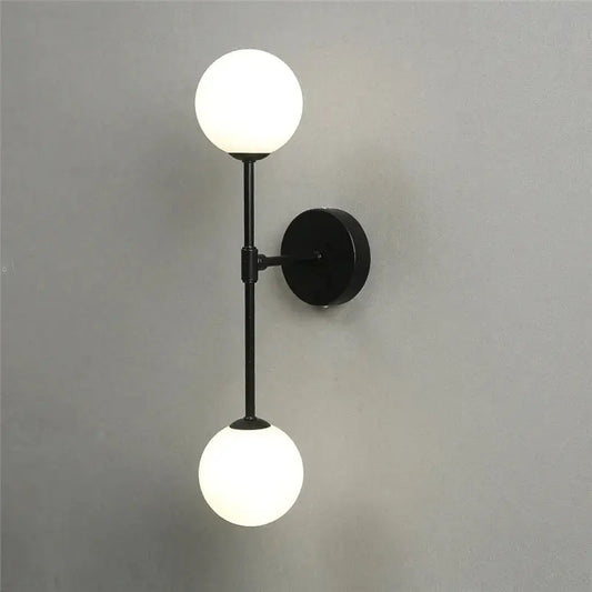 Black metal wall lamp with dual frosted golden glass globes perfect for decorbites golden glass led bedroom lighting
