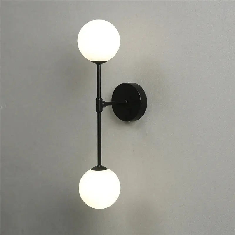Black metal wall lamp with dual frosted golden glass globes perfect for decorbites golden glass led bedroom lighting