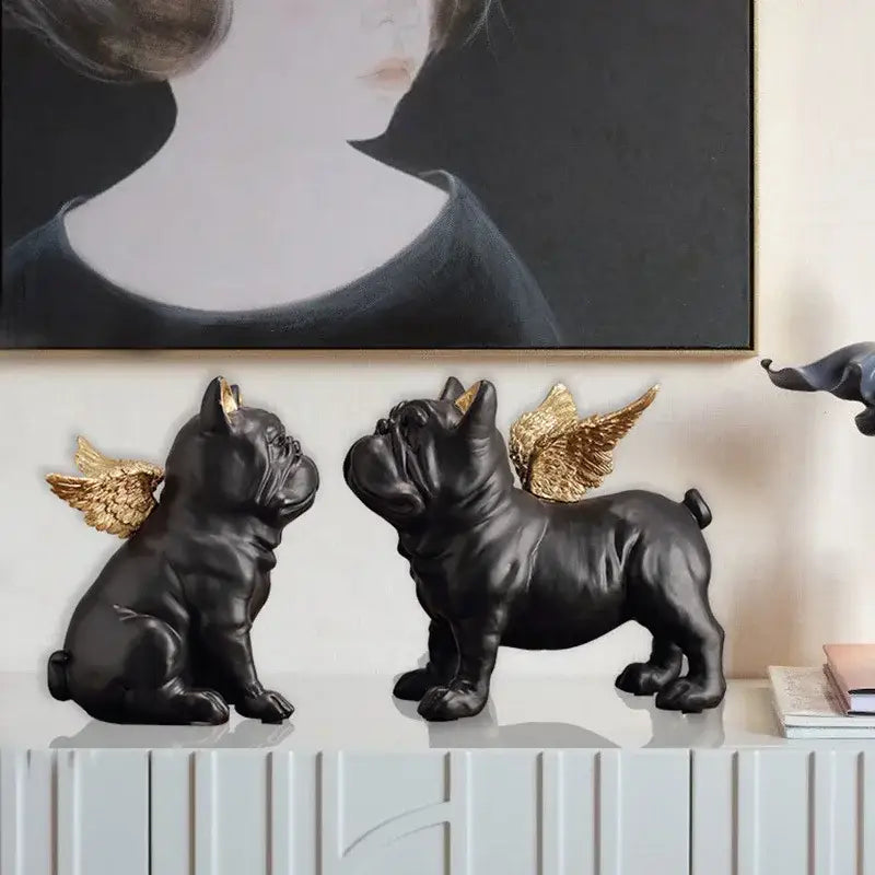 Black and gold winged french bulldog dog sculpture featuring two black bulldog dog figurines with gold wings for living room decor