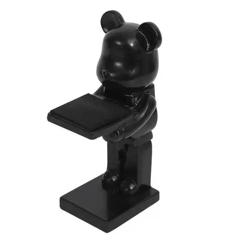 Black glossy cartoon bear watch stand holding a rectangular tray with iridescent purple accents for bedroom decor