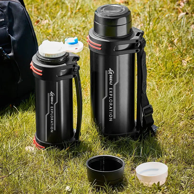 Black and red insulated stainless steel outdoor travel flask by gimaki exploration with carrying straps and screw-on lids