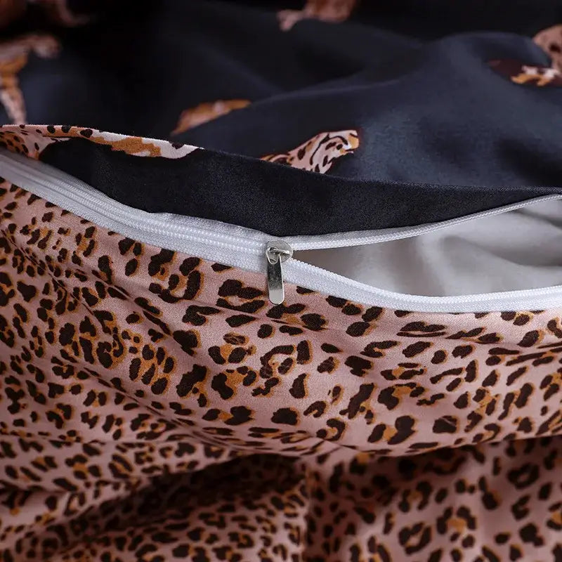Black and rose gold leopard print duvet set featuring pink leopard print fabric with a silver zipper decorbites leopard print