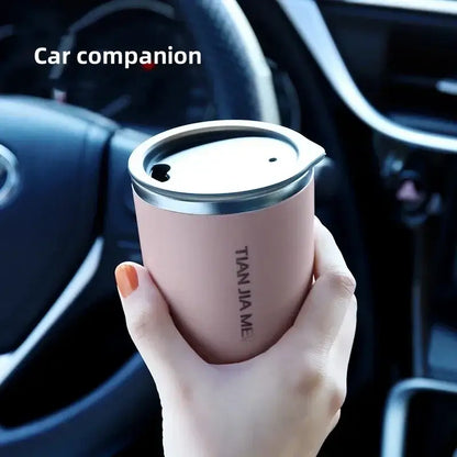 Pink insulated travel mug with stainless steel lid and sleek minimalist design 300ml stainless steel vacuum flask