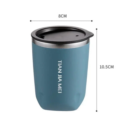 Teal-colored 300ml stainless steel vacuum travel mug with black lid silver rim and vertical white lettering