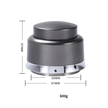 A sleek matte black and chrome decorbites adjustable coffee tamper with cylindrical body and rounded top for barista use