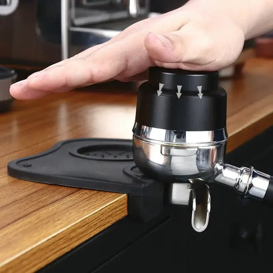 Black and stainless steel decorbites adjustable coffee tamper with directional arrows for precise espresso tamping