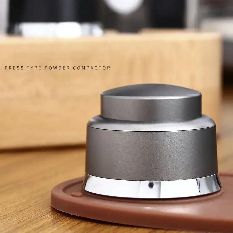 Silver-toned decorbites adjustable coffee tamper with brushed metal finish and polished chrome accent ring for precise tamping