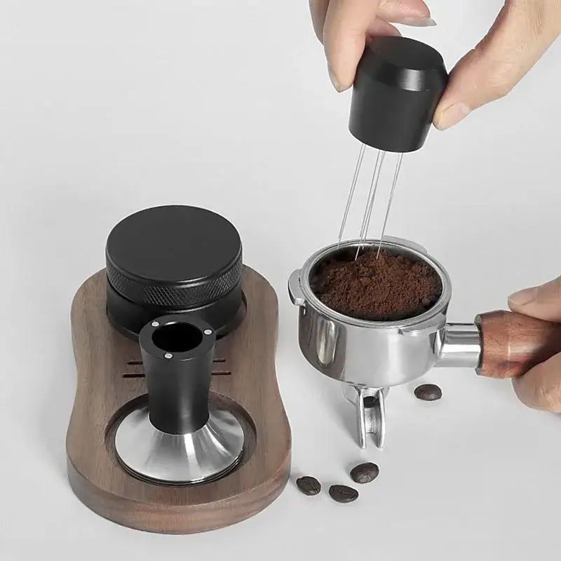 Black metal coffee distributor tamper set with wooden base and textured grip for decorbites coffee distributor use