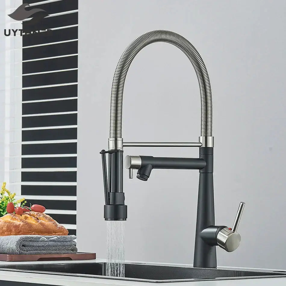 Black and stainless steel kitchen faucet with flexible corrugated spout featuring decorbites brass pull style