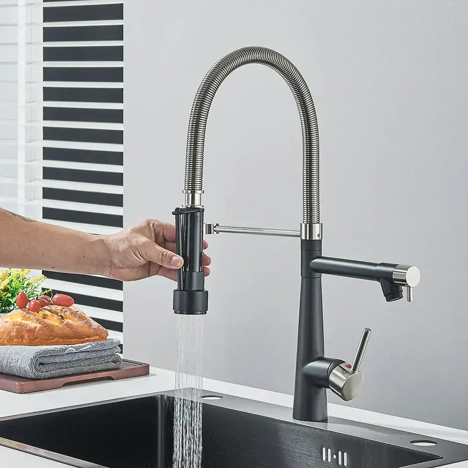 Black and stainless steel kitchen faucet with black matte finish flexible gooseneck spout and decorbites brass pull spray head