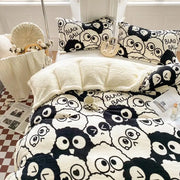 Black and white cartoon print cozy blanket duvet set featuring a playful sheep design with oversized eyes by decorbites