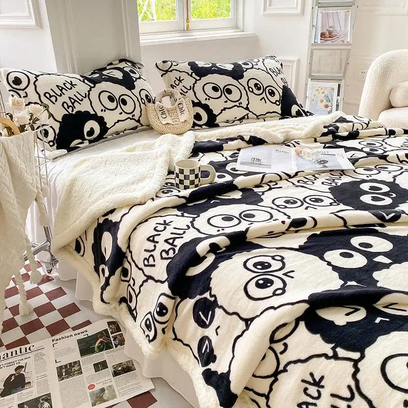 Black and white cozy blanket with a playful cartoon print panda design and black ball text for bedroom decorbites cartoon print