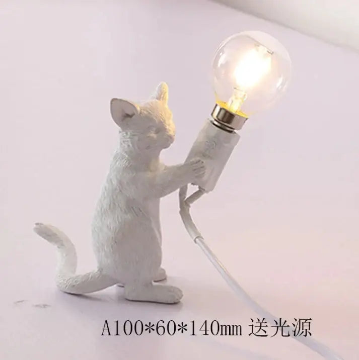 White ceramic cat resin table lamp holding lit bulb decorative decorbites cat resin for bedroom decor