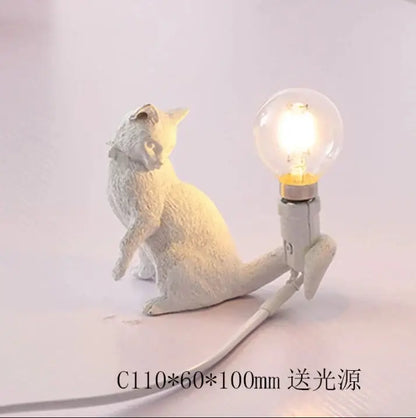 White ceramic cat resin table lamp with glowing bulb on back for bedroom decorbites cat resin decorbites cat resin table lamp