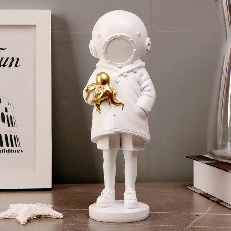 White resin diver girl resin statue wearing vintage diving helmet and coat holding a golden octopus decor for living room