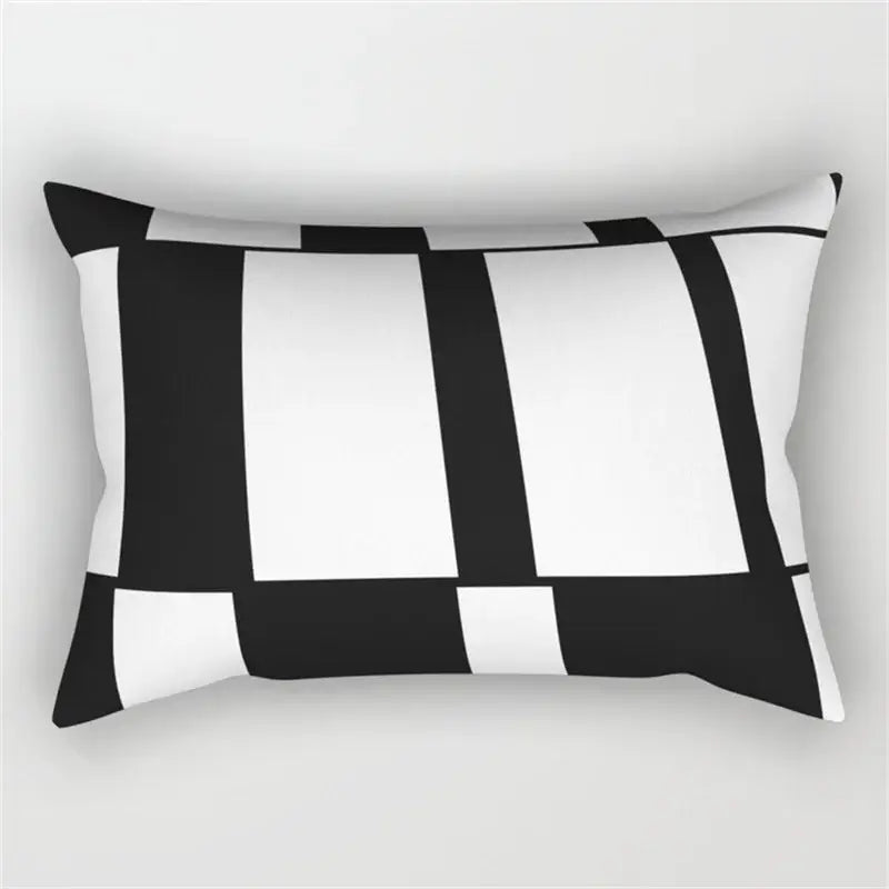 Rectangular pillow with a modern black and white geometric wave line pattern for bedroom decor
