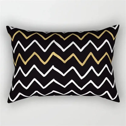 Black rectangular pillow with bold white and metallic gold geometric wave line pattern for bedroom decor