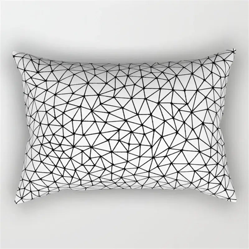 Rectangular pillow with white base and intricate black geometric wave line pattern for bedroom decor