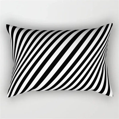 Rectangular pillow with bold black and white diagonal stripes featuring geometric wave line design for bedroom decor