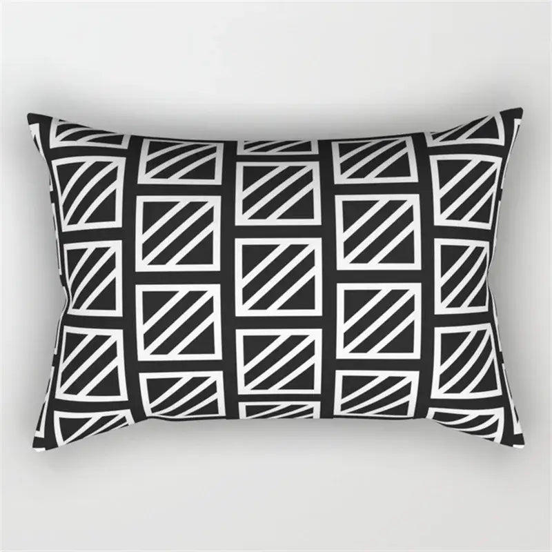 Black and white rectangular pillow with geometric wave line pattern of intersecting squares for bedroom decor