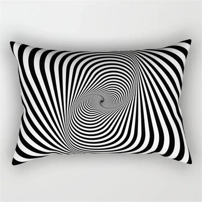 Rectangular black and white pillow with bold geometric wave line spiral stripes for modern bedroom decor