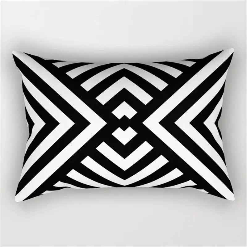 Rectangular black and white pillow with bold geometric wave line pattern for bedroom decor