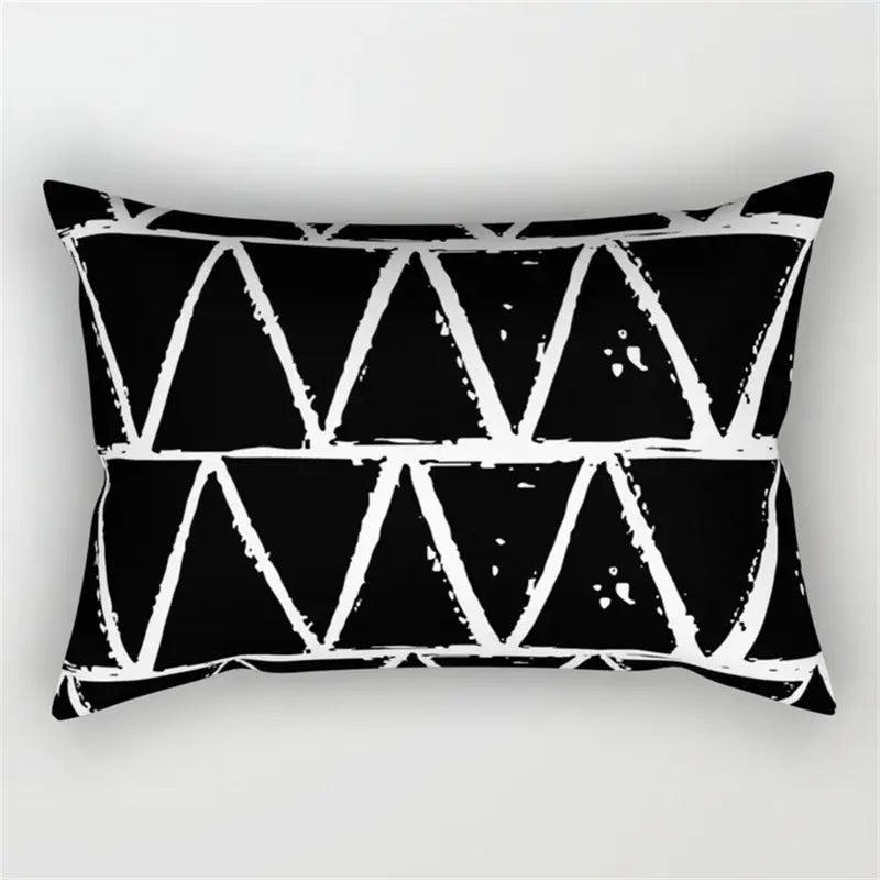 Black rectangular pillow with bold white geometric wave line triangle pattern for bedroom decor