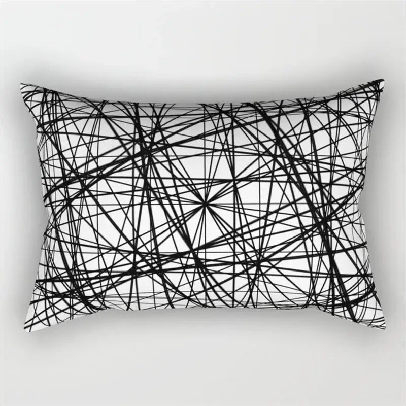Rectangular pillow with a bold black and white geometric wave line pattern for bedroom decor